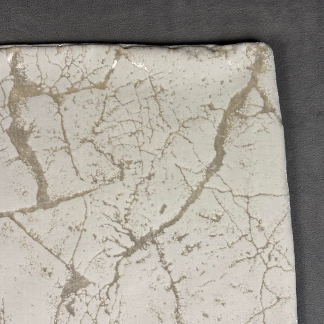 Handmade in the USA using premium designer fabric, this square pillow cover features a sophisticated marble-inspired...