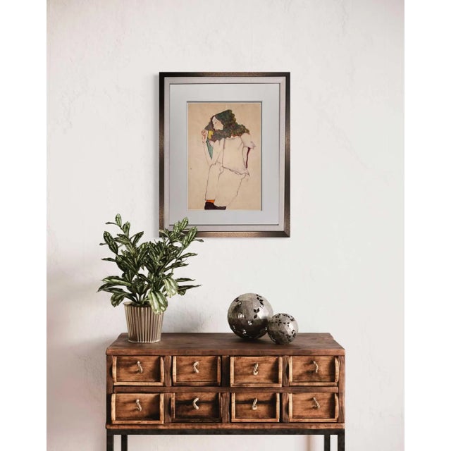 Egon Schiele Lithograph Gouache titled Sleeping Girl. Size: 49.2x35.6cm. Frame Size: 22 1/2 x 27 3/4 in. This lithograph...