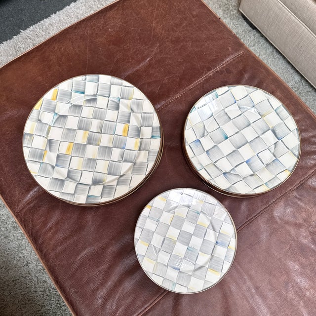 Design Plus Gallery presents a Set of Twenty-Six Enamelware Sterling Check Dinnerware from Mackenzie Childs. This...
