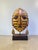 Vintage mixed-media tribal mask sculpture signed by Chilean artisan Christian Luis Gómez, hand-hammered and textured brass...