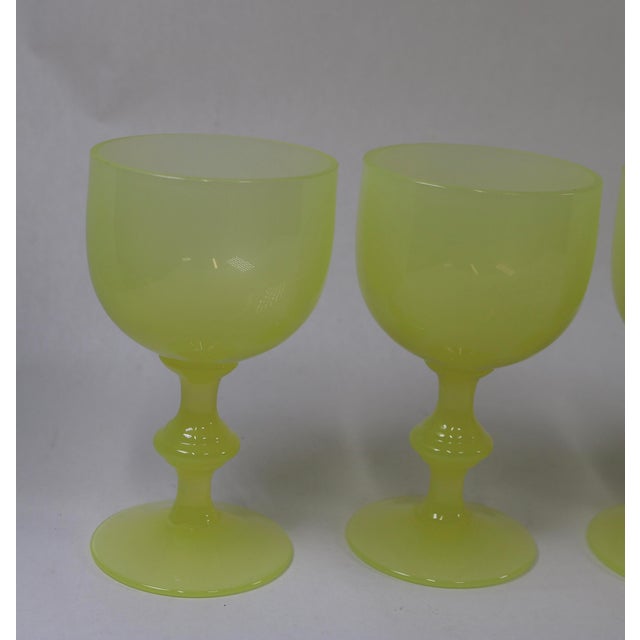 Stunning set of 5 wine glasses attributed to Portieux Vallerysthal. I love the bright and cheery yellow and the simple and...