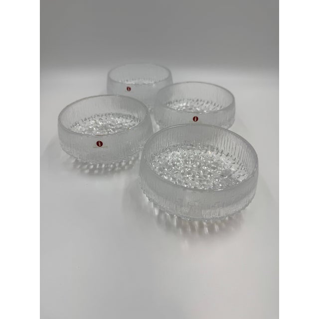 A stunning set of four authentic Iittala “Ultima Thule” dessert bowls designed by renowned Finnish designer Tapio...
