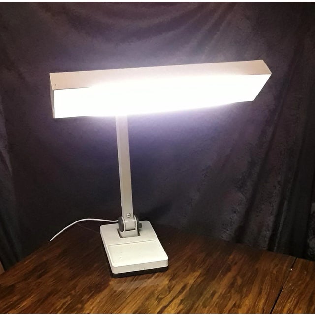 Vintage STK 215 F Desk Lamp from Waldmann, 1960s, in Good conditions. Designed 1960 to 1969 This piece has an attribution...