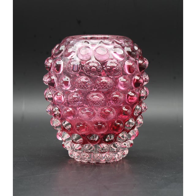 Incredible mouth-blown Murano glass vase in rare pink bugnato from the middle of the last century. This wonderful object...