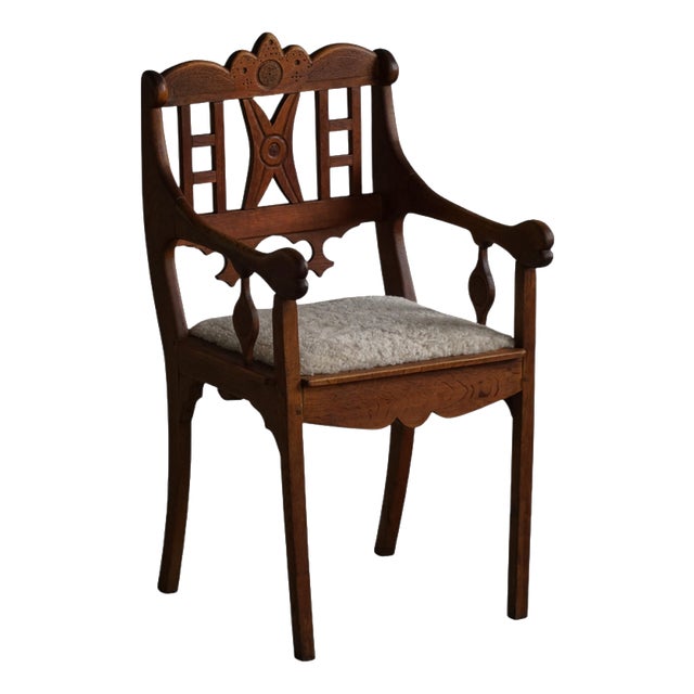 Danish Folk Art Armchair in Oak with Lambswool Seat, 1930s For Sale