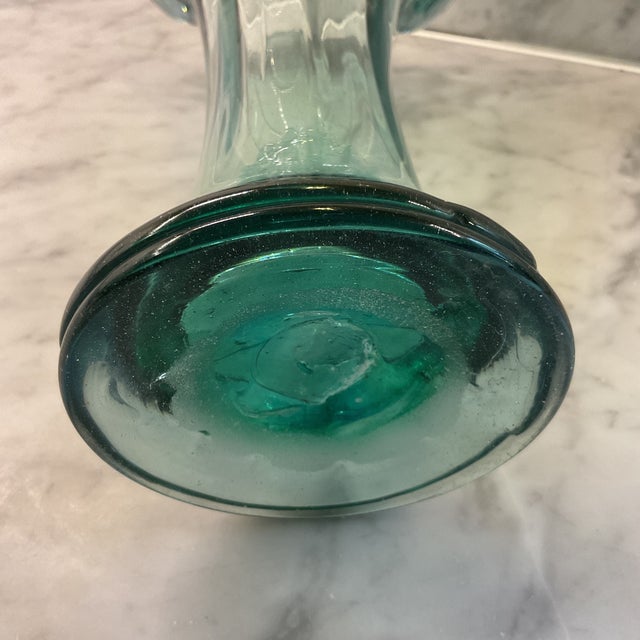 Aqua/seafoam blown glass vase. 11” H Top D 7”. Bottom D 4”