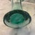 Aqua/seafoam blown glass vase. 11” H Top D 7”. Bottom D 4”