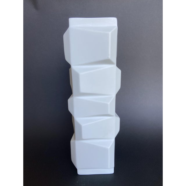 Striking sculptural porcelain vase by Hutschenreuther (Germany), featuring a bold geometric and faceted design. Its...
