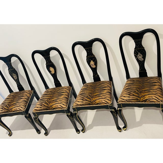 Gorgeous set of 4 high back lacquer side or dining chairs with tiger brocade upholstery. Mid 20 th century