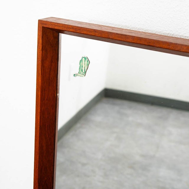 Fantastic teak framed rectangular mirror. Great for an entryway or for use in a bedroom. Has remnants of an original...