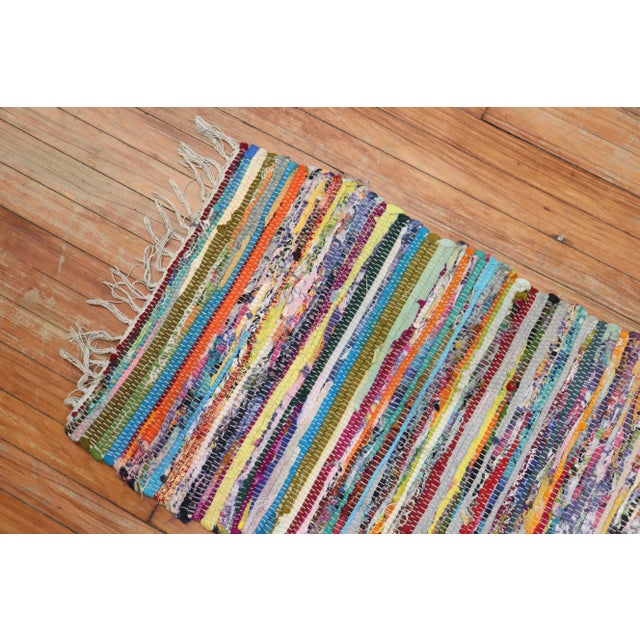 American Braided rugs provided a way for people to make use of fabrics from other worn goods (clothing, storage sacks,...