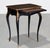 This a very elegant late 19th-century French Napoleon III period mechanical table executed in a rich ebonized finish with...