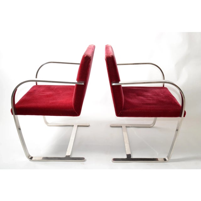 Pair of Mid-Century Modern Mies van der Rohe flatbar Brno for Knoll in stainless steel with the original dark red velvet...