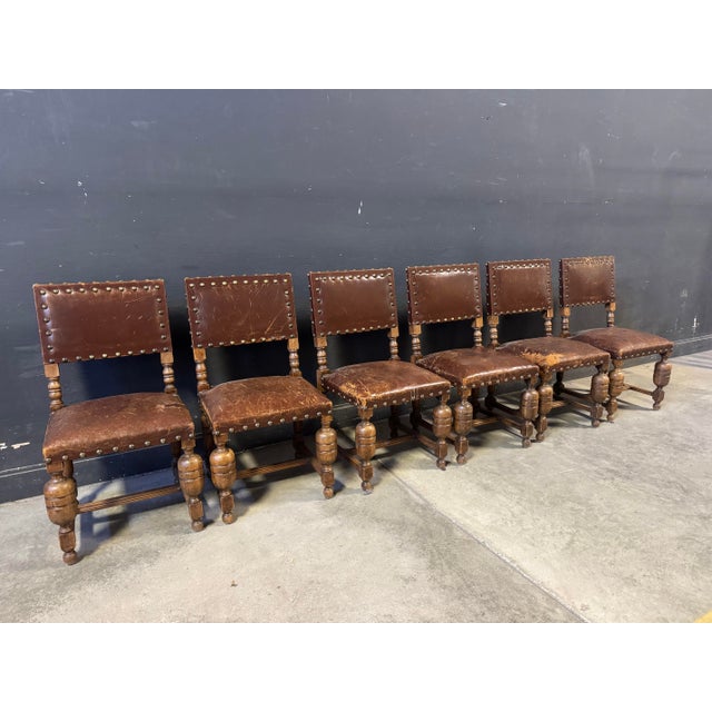 Set of 6pcs 19th Century English Leather Dining Chairs. Original leather. Dimensions: H 35 ” x W 18” x D 18.5” x SH 18.5”....