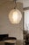 A striking Medusa pendant lamp by Carlo Nason for A.V. Mazzega, featuring a sculptural layered glass form that gives the...
