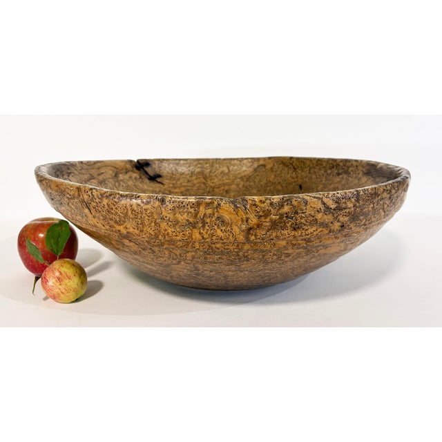 Offered is a monumental 18th Century American black ash burl bowl with early Make-Do wire Repairs (17¾" Diameter) Overview...