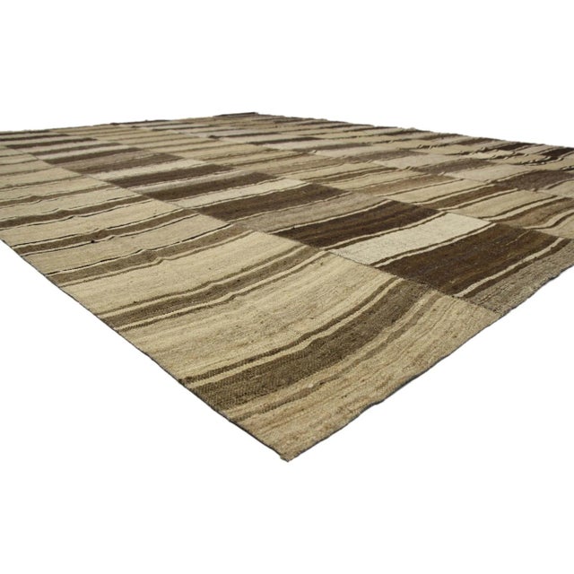 60635 Vintage Turkish Kilim Rug with Earth-Tone Colors, 13'00 x 16'00. Wabi-Sabi embraces rustic finesse in this handwoven...