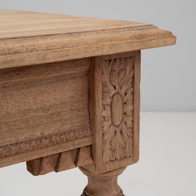 This 19th-century French writing table captures the refined neoclassical elegance of the Louis XVI style. Crafted from...