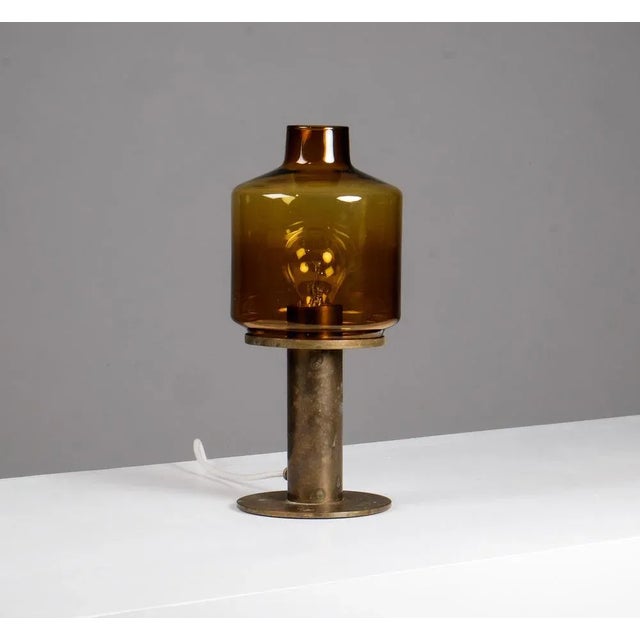 Table lamp model B-102 produced by Hans-Agne Jakobsson in Markaryd, Sweden. New wiring. Good condition. This piece is...