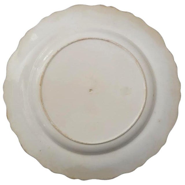 This William Adams India #7 red transferware 10 1/8 inch plate from Staffordshire, dating back to the 1830s-1840s, is a...