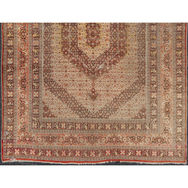Measures: 12'8 x 17'7 Antique Haji Jalili Tabriz Rug With Ivory Field and Fine Medallion Design 12'8 X 17'7. Keivan Woven...