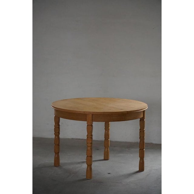 Danish Modern Round Dining Table in Oak with Extension by Henning Kjærnulf, 1960s For Sale - Image 4 of 18