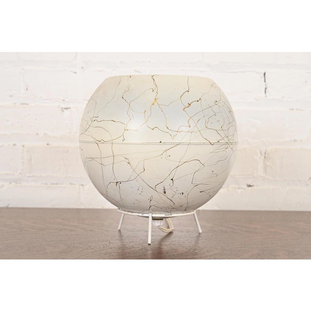 A unique Mid-Century Modern orb eyeball desk lamp or table lamp USA, Circa 1950s Measures: 7.5"W x 7.5"D x 8"H. Very good...