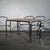 This set of four cantilever dining chairs is designed in the spirit of Gastone Rinaldi, the celebrated Italian designer...