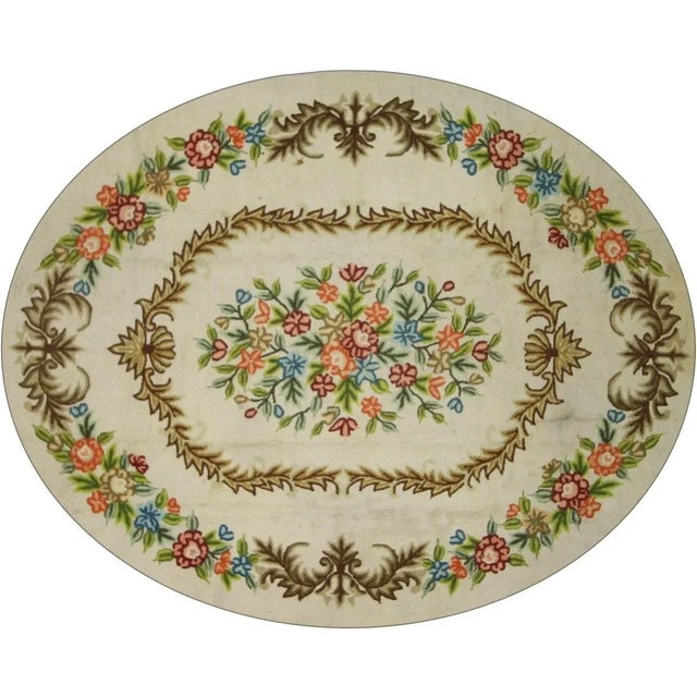 View this beautiful Chinese Antique Floral Hooked Oval Rug with French Aubusson and Savonnerie Style. Desirable Age Wear....