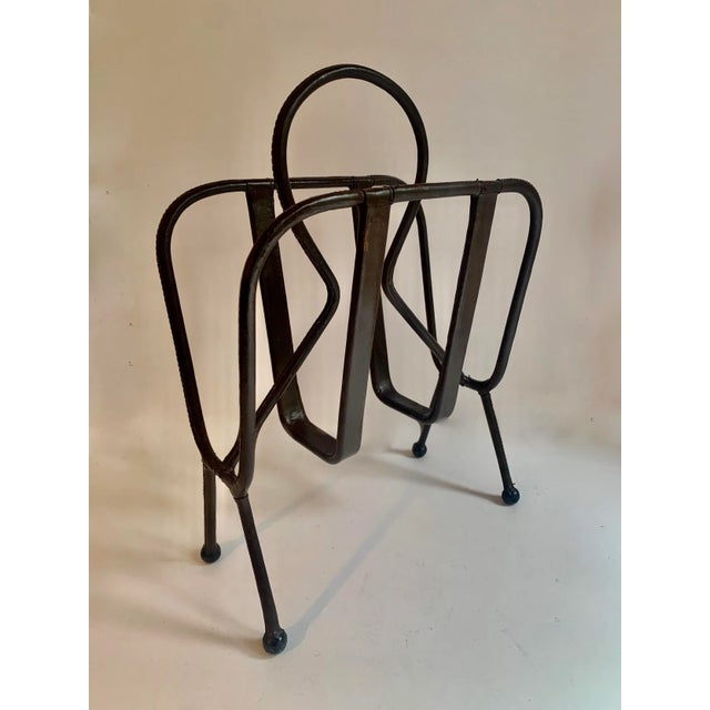 French Designer, Jacques Adnet is best known for impeccable designs that bring leather, function and design together. The...