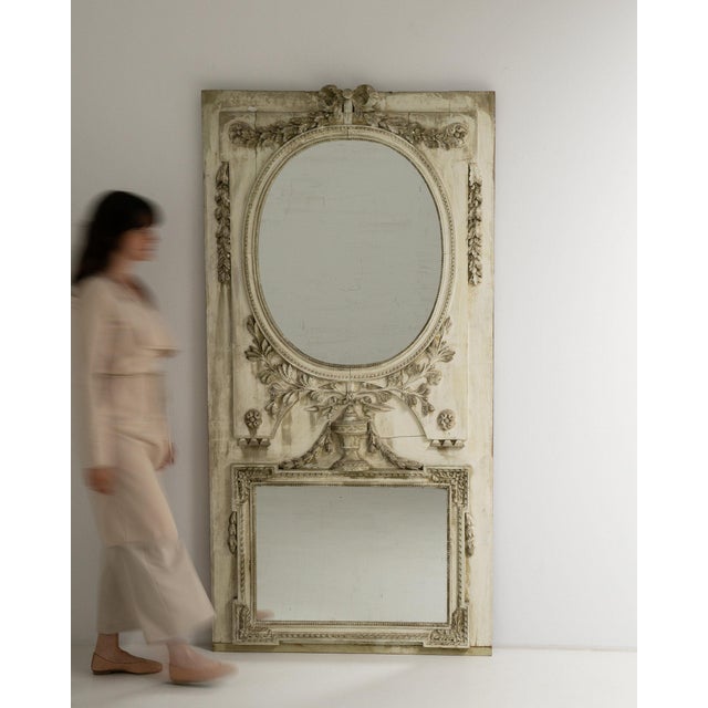 This piece presents as a cabinet, distinguished by whitewashed carved wood, scroll motif. Dating to Early 19th Century and...