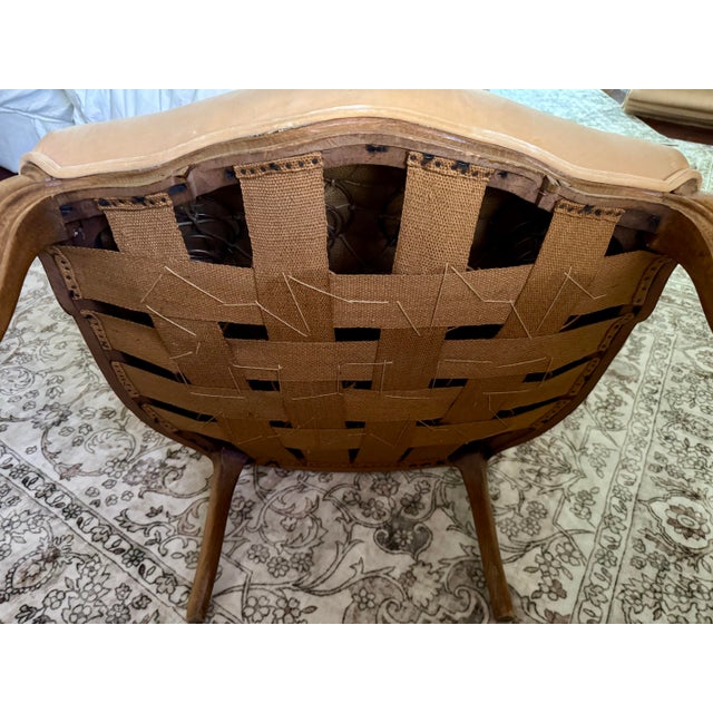 A beautiful antique French bergère armchair in golden velvet with a carved fruitwood frame. This is a serious piece of...