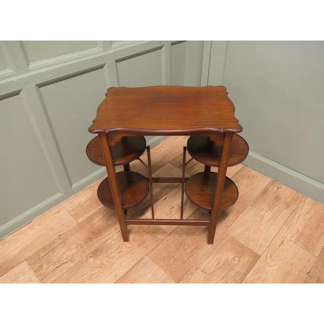 Attractive Side Table with a Double Cake Stand This charming and unusual piece is in good condition, it is a central...