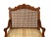 Regence style walnut fauteuil caned seat and back with cushion.