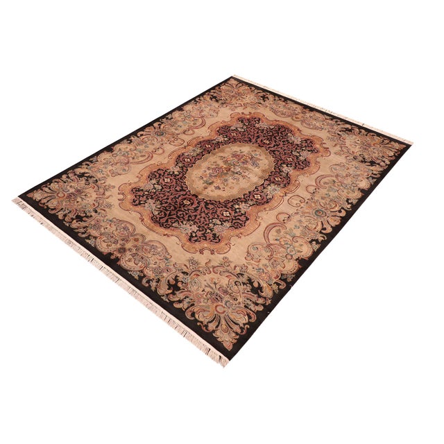 Designed with mesmerizing intricacy and gorgeous color palette, this hand-knotted masterpiece demonstrates the beauty and...