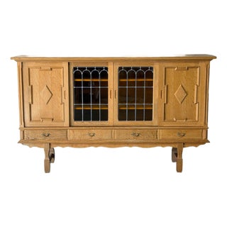 In Style of Henning Kjærnulf Oak High Sideboard Credenza With Sliding Leaded Glass Doors Danish Mid-Century Modern 1970s For Sale