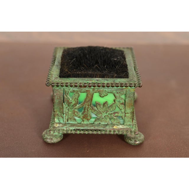 A beautiful Arts & Crafts or Art Nouveau period "Grapevine" pattern bronze and slag glass pen brush or pen wipe with...