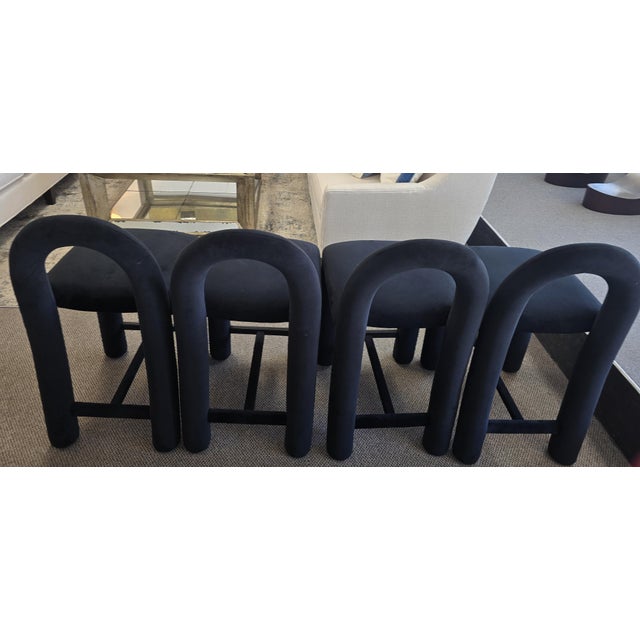 Set of four, Sun at Six counter height stools in black velvet.