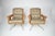 A pair of French vintage lounge chairs attributed to Raphaël Raffel for Apelbaum, dating to the 1970s. Upholstered in...