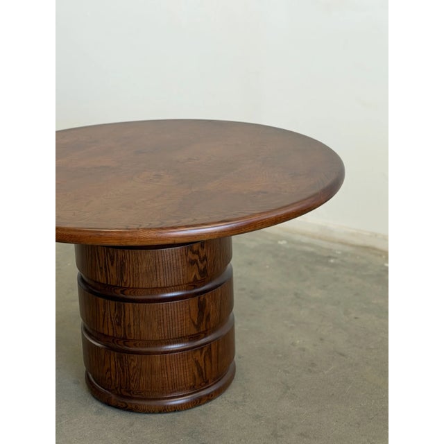 W48 H30 KC27.5 A one-of-a-kind dining table blending vintage character with custom craftsmanship. The richly figured...