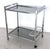 Elegant Italian mid-century modern two-tier rolling bar cart crafted from chromed steel. The cart features grey...