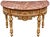 A beautifully ornate Italian Neoclassical-style demilune console table, featuring an exceptionally detailed hand-carved...