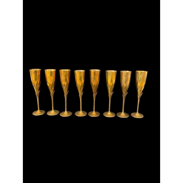 This set of 8 elegant stem swirl vintage brass champagne flutes stands at 9.25" tall and has a diameter of 2". Made in...