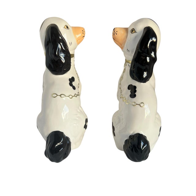 Elevate your home decor with this exquisite pair of Staffordshire-style dog statues. Each figure stands at 7.5 inches...