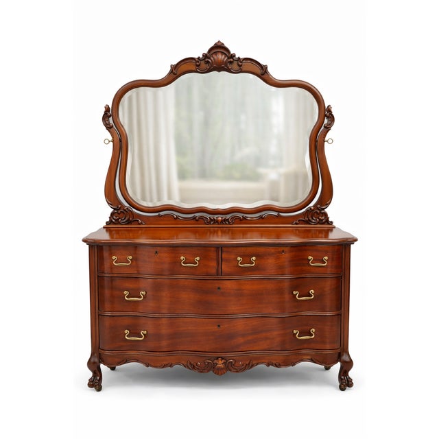 Outstanding oversized American oak lowboy dresser with mirror.. The design elements combines fabulous ribbon mahogany,...