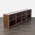 This Room and Board bookshelf features a sleek, low-profile design with a natural walnut wood finish. It offers adjustable...