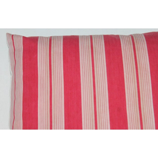 This beautiful down and feather filled vintage tucking pillow has great deep red stripes that give this pillow a great...