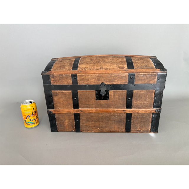 This darling wood and metal child’s doll trunk has been in my family since I was a child. I used it to display my...
