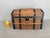 This darling wood and metal child’s doll trunk has been in my family since I was a child. I used it to display my...