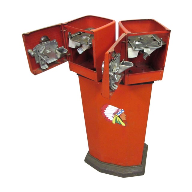 1940s gum ball machine base with orange-red enamel popularly known as “Cherokee red”. An original Native American emblem...